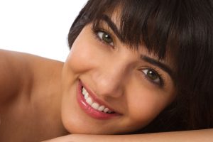 Woman with a beautiful smile thanks to the southlake cosmetic dentist