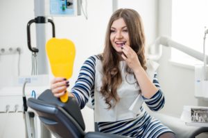 woman smiling in dental chair