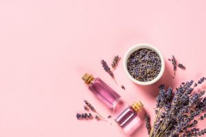 Lavender essential oil in Southlake against pink background