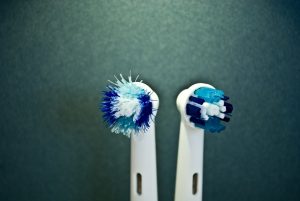 Old and new toothbrush heads side by side