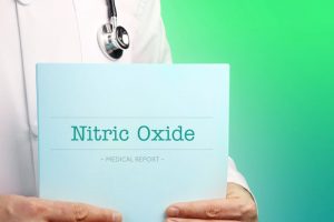 Doctor holding nitric oxide medical report